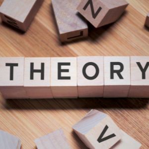 puzzle blocks spelling out the word theory