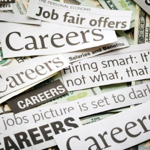 newspaper headlines with career terms written