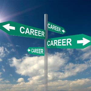 street signs  pointing in different directions with the word career