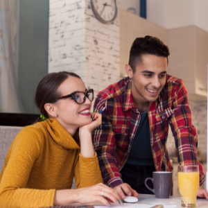 Couple working on computer together